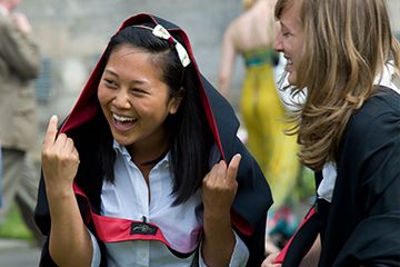 Recently graduated University of St Andrews students celebrating