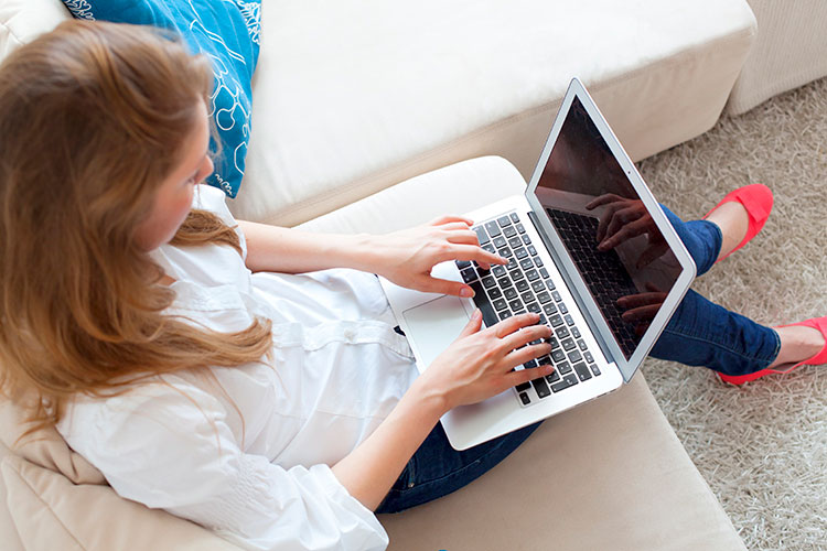 Image of person using laptop