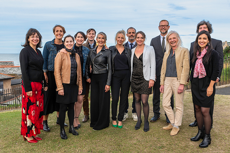 students and staff of Sciences Po 2022 executive education study week shown standing outdoors with the North Sea visible in the distance