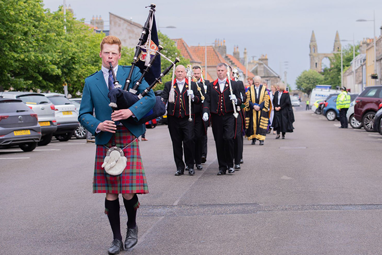 Chancellor's Piper leads procession along North Street St Andrews