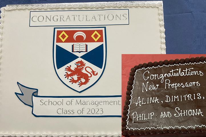 cake decorated with University of St Andrews crest and words, Congratulations School of Management Class of 2023, with inset of cake with words, Congratulations new professors Alina, Dimitris, Philip and Shiona