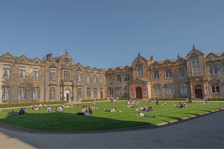 Students on the lawn of the United Colleges