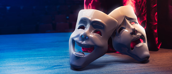 two masks on stage