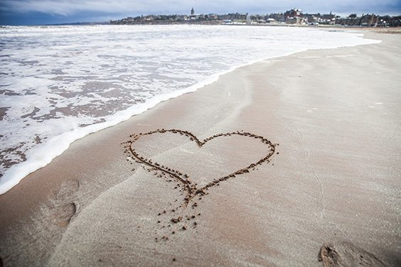 heart drawn in the sand