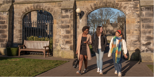 three students walking