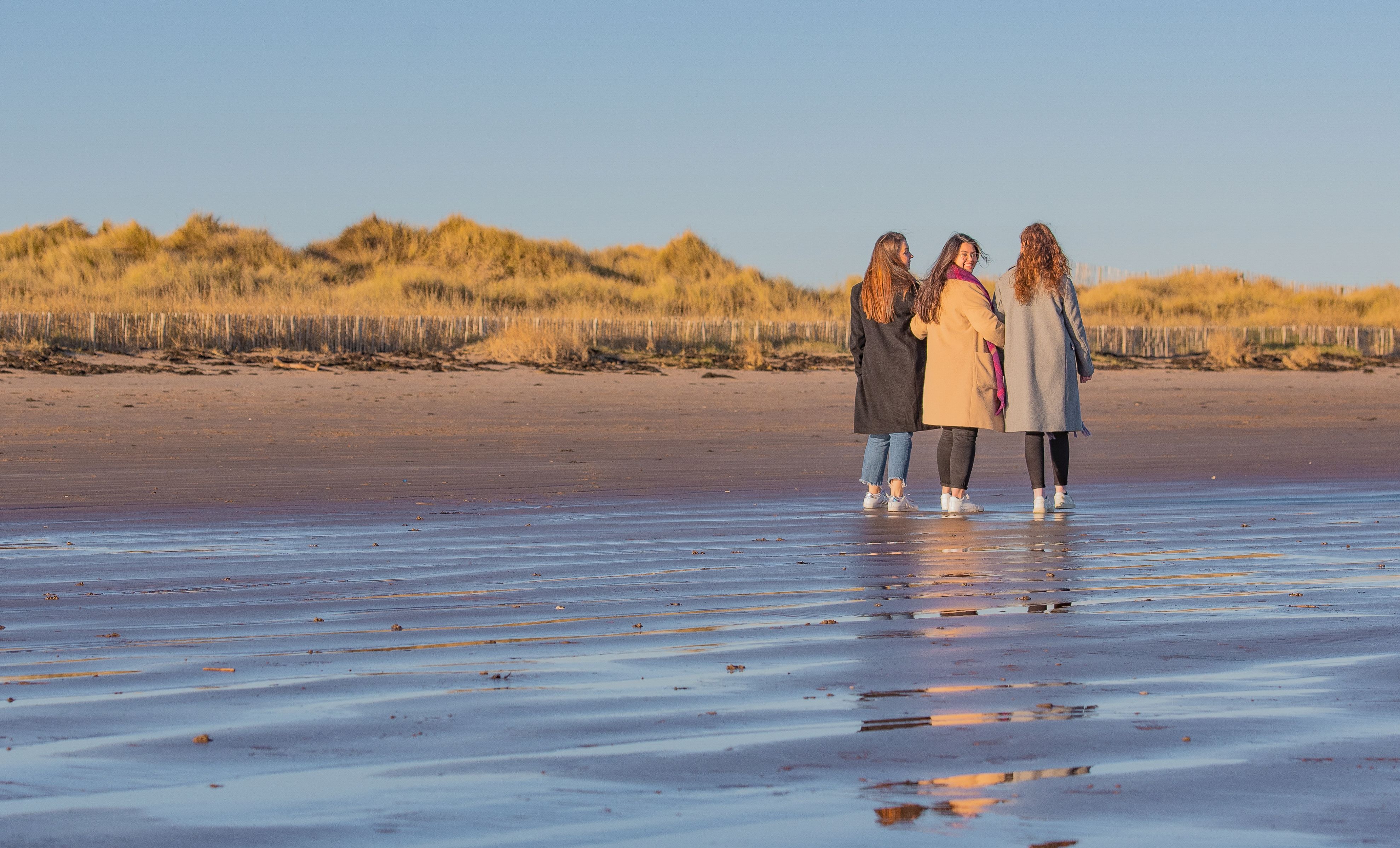 Three women on beach